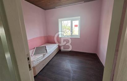 BURHANİYE'DE DOĞA İLE İÇ İÇE MÜSTAKİL BAHÇELİ SATILIK KÖY EVİ