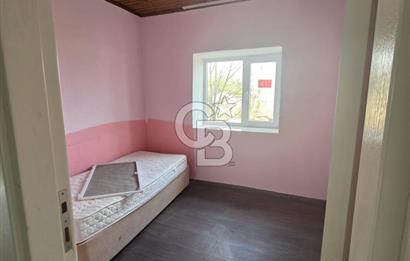 BURHANİYE'DE DOĞA İLE İÇ İÇE MÜSTAKİL BAHÇELİ SATILIK KÖY EVİ