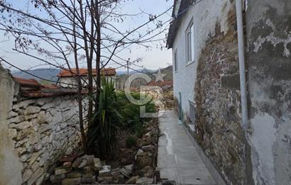 BURHANİYE'DE DOĞA İLE İÇ İÇE MÜSTAKİL BAHÇELİ SATILIK KÖY EVİ