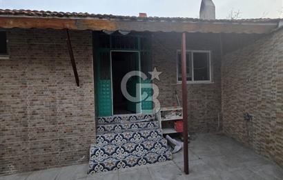 BURHANİYE'DE DOĞA İLE İÇ İÇE MÜSTAKİL BAHÇELİ SATILIK KÖY EVİ