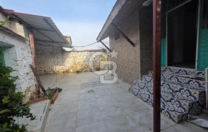 BURHANİYE'DE DOĞA İLE İÇ İÇE MÜSTAKİL BAHÇELİ SATILIK KÖY EVİ