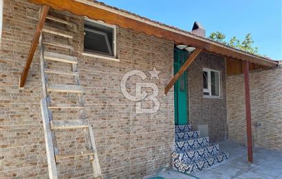 BURHANİYE'DE DOĞA İLE İÇ İÇE MÜSTAKİL BAHÇELİ SATILIK KÖY EVİ