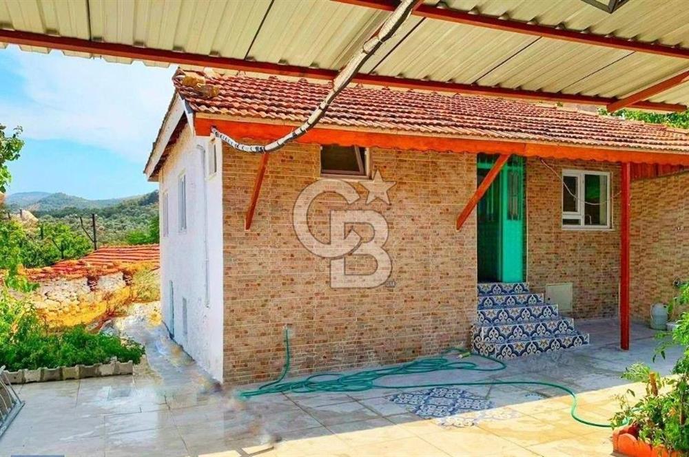 BURHANİYE'DE DOĞA İLE İÇ İÇE MÜSTAKİL BAHÇELİ SATILIK KÖY EVİ