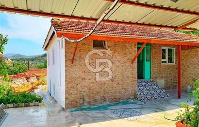 BURHANİYE'DE DOĞA İLE İÇ İÇE MÜSTAKİL BAHÇELİ SATILIK KÖY EVİ