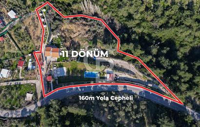 BUCA KAYNAKLAR BELENBAŞIN’DA İÇERİSİNDE RUHSATLI IŞLATME BULUNAN SATILIK 11 Dönüm TARLA 