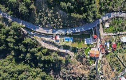 BUCA KAYNAKLAR BELENBAŞIN’DA İÇERİSİNDE RUHSATLI IŞLATME BULUNAN SATILIK 11 Dönüm TARLA 