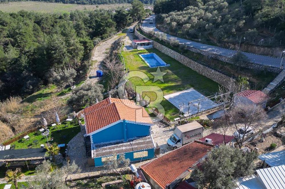 BUCA KAYNAKLAR BELENBAŞIN’DA İÇERİSİNDE RUHSATLI IŞLATME BULUNAN SATILIK 11 Dönüm TARLA 