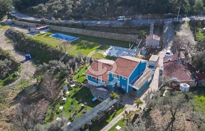 BUCA KAYNAKLAR BELENBAŞIN’DA İÇERİSİNDE RUHSATLI IŞLATME BULUNAN SATILIK 11 Dönüm TARLA 