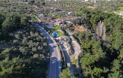 BUCA KAYNAKLAR BELENBAŞIN’DA İÇERİSİNDE RUHSATLI IŞLATME BULUNAN SATILIK 11 Dönüm TARLA 