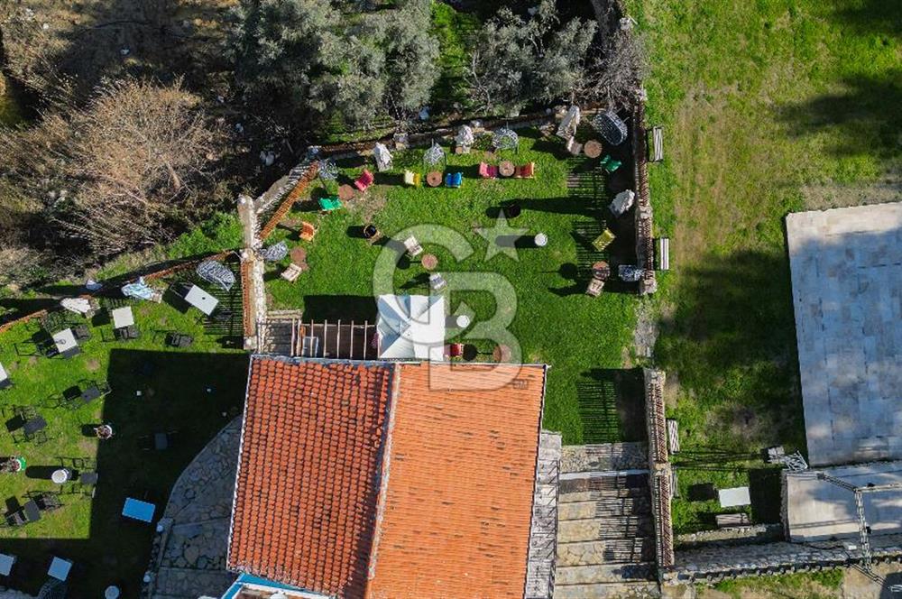 BUCA KAYNAKLAR BELENBAŞIN’DA İÇERİSİNDE RUHSATLI IŞLATME BULUNAN SATILIK 11 Dönüm TARLA 