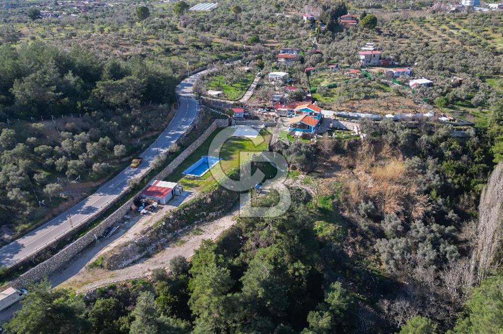 BUCA KAYNAKLAR BELENBAŞIN’DA İÇERİSİNDE RUHSATLI IŞLATME BULUNAN SATILIK 11 Dönüm TARLA 