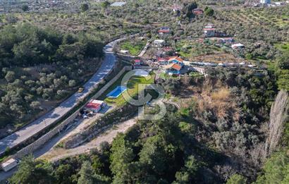 BUCA KAYNAKLAR BELENBAŞIN’DA İÇERİSİNDE RUHSATLI IŞLATME BULUNAN SATILIK 11 Dönüm TARLA 