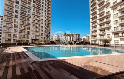 Çiğli Marka 333 Sitesinde Havuz Cephe Kiralık 1+1 Daire