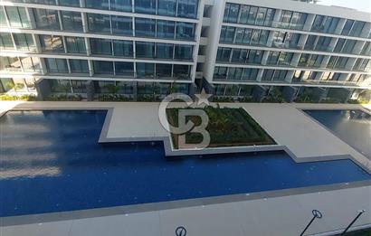 KIBRIS İSKELE GRAND SAPPHİRE DE SATİLİK HAVUZ CEPHELİ FULL EŞYALI 2+1 DAİRE 