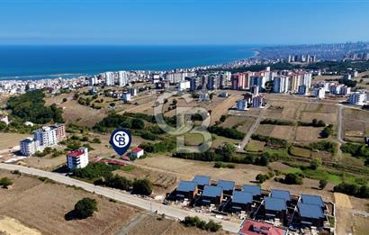 ATAKUM BÜYÜKOYUMCA'DA AZİZ IŞIK BULVARINDA KAT KARŞILIĞI ARSA