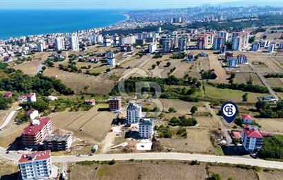 ATAKUM BÜYÜKOYUMCA'DA AZİZ IŞIK BULVARINDA KAT KARŞILIĞI ARSA