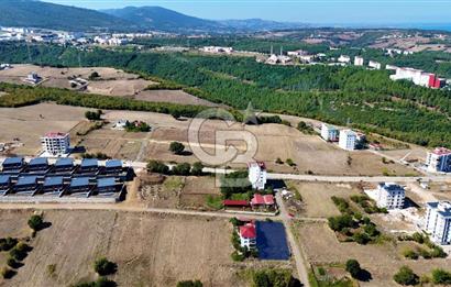 ATAKUM BÜYÜKOYUMCA'DA AZİZ IŞIK BULVARINDA KAT KARŞILIĞI ARSA