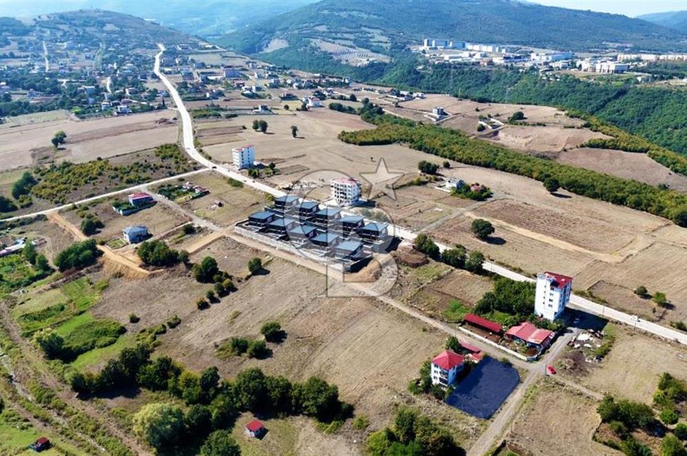 ATAKUM BÜYÜKOYUMCA'DA AZİZ IŞIK BULVARINDA KAT KARŞILIĞI ARSA