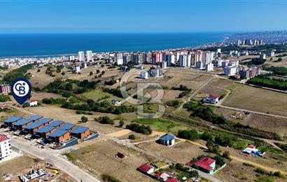 ATAKUM BÜYÜKOYUMCA'DA AZİZ IŞIK BULVARINDA KAT KARŞILIĞI ARSA