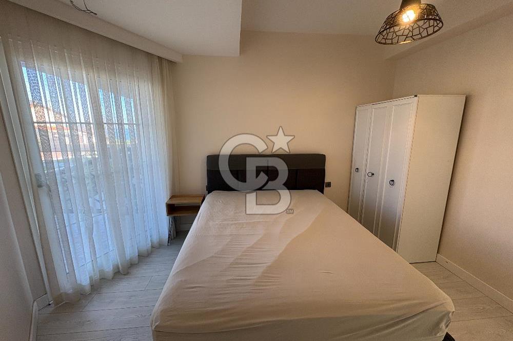 URLA'DA HAVUZLU SİTE İÇİNDE BAHÇELİ 1+1 EŞYALI KİRALIK DAİRE