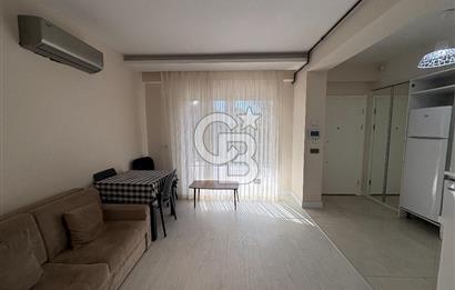 URLA'DA HAVUZLU SİTE İÇİNDE BAHÇELİ 1+1 EŞYALI KİRALIK DAİRE