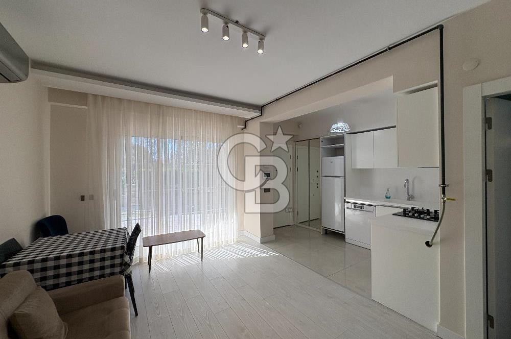 URLA'DA HAVUZLU SİTE İÇİNDE BAHÇELİ 1+1 EŞYALI KİRALIK DAİRE