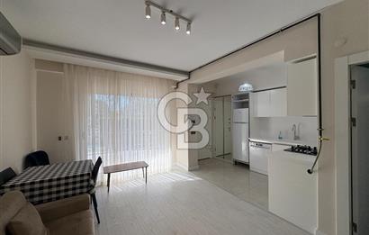 URLA'DA HAVUZLU SİTE İÇİNDE BAHÇELİ 1+1 EŞYALI KİRALIK DAİRE