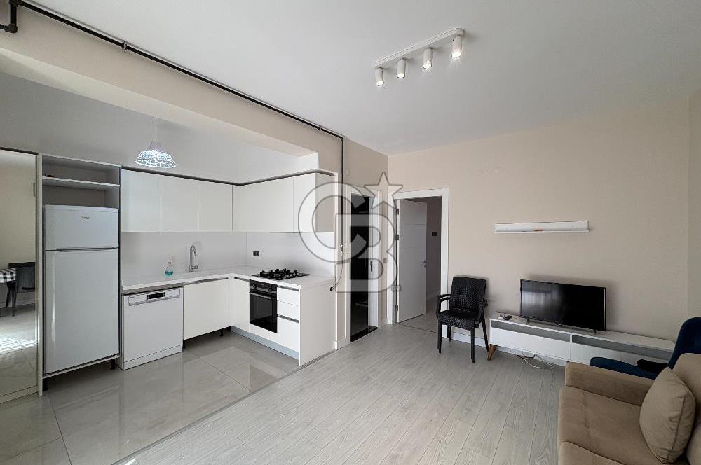 URLA'DA HAVUZLU SİTE İÇİNDE BAHÇELİ 1+1 EŞYALI KİRALIK DAİRE