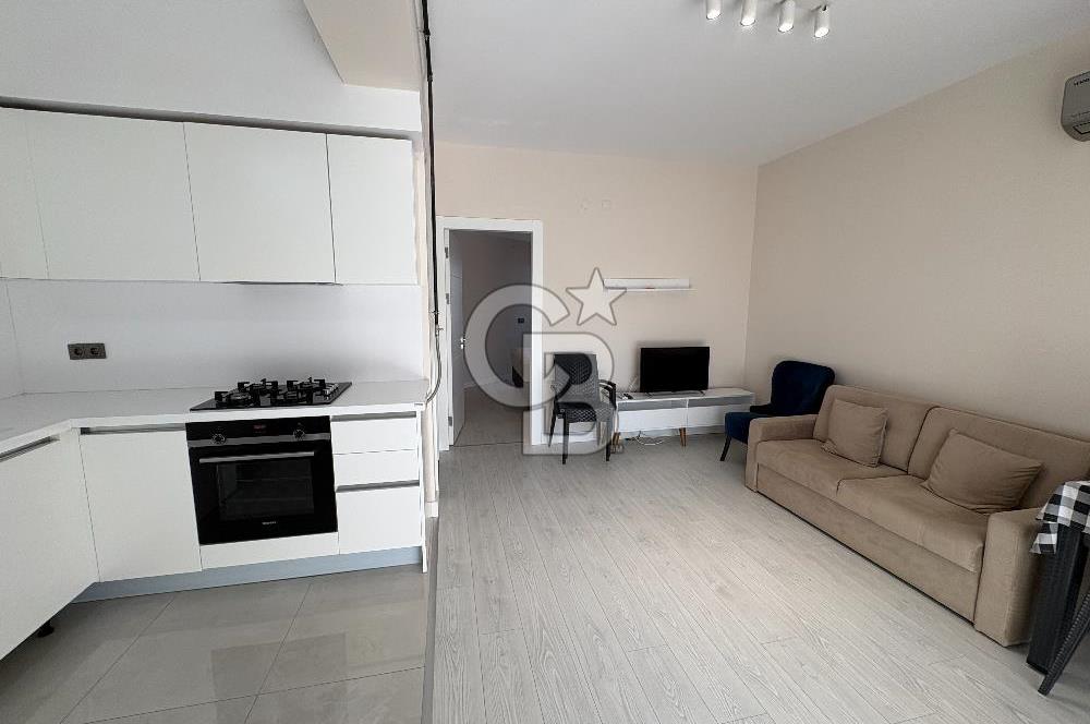 URLA'DA HAVUZLU SİTE İÇİNDE BAHÇELİ 1+1 EŞYALI KİRALIK DAİRE