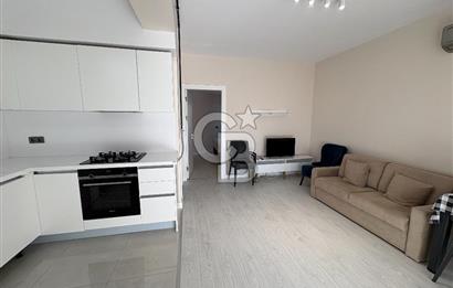 URLA'DA HAVUZLU SİTE İÇİNDE BAHÇELİ 1+1 EŞYALI KİRALIK DAİRE