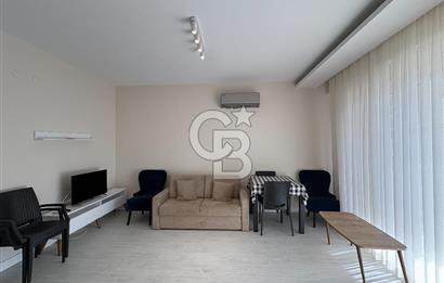 URLA'DA HAVUZLU SİTE İÇİNDE BAHÇELİ 1+1 EŞYALI KİRALIK DAİRE