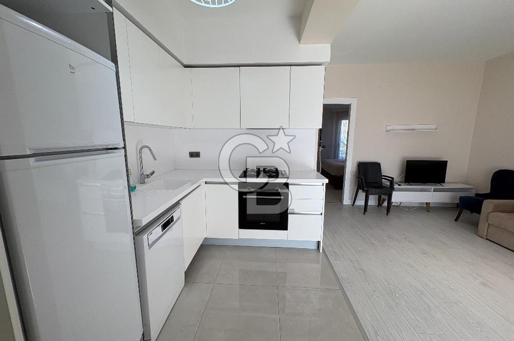 URLA'DA HAVUZLU SİTE İÇİNDE BAHÇELİ 1+1 EŞYALI KİRALIK DAİRE