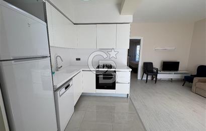 URLA'DA HAVUZLU SİTE İÇİNDE BAHÇELİ 1+1 EŞYALI KİRALIK DAİRE