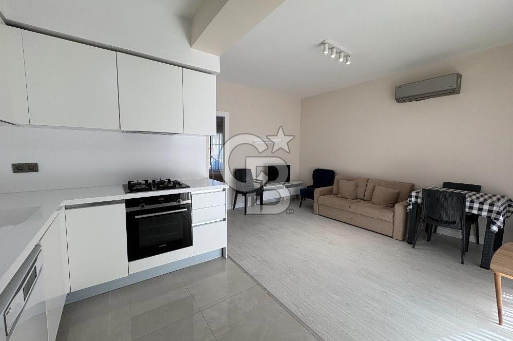 URLA'DA HAVUZLU SİTE İÇİNDE BAHÇELİ 1+1 EŞYALI KİRALIK DAİRE