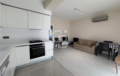 URLA'DA HAVUZLU SİTE İÇİNDE BAHÇELİ 1+1 EŞYALI KİRALIK DAİRE