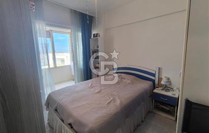 AYVALIK SARIMSAKLI'DA DENİZE 100 METRE – ÖZEL PLAJLI SİTEDE EŞYALI DAİRE