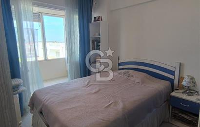 AYVALIK SARIMSAKLI'DA DENİZE 100 METRE – ÖZEL PLAJLI SİTEDE EŞYALI DAİRE