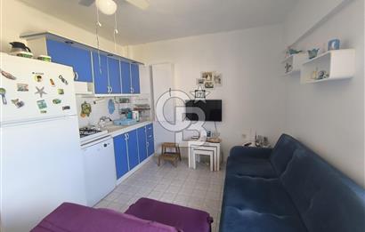 AYVALIK SARIMSAKLI'DA DENİZE 100 METRE – ÖZEL PLAJLI SİTEDE EŞYALI DAİRE