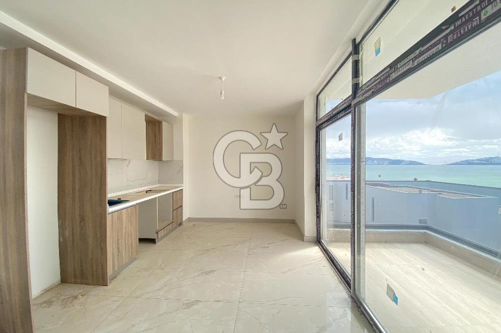 KIYIKIŞLACIK ZEYTİNLİKUYU ATASAYANLAR BEACH TE DENİZ MANZARALI 1+1 