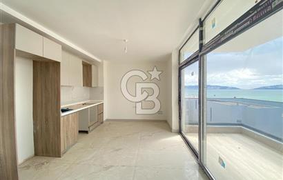 KIYIKIŞLACIK ZEYTİNLİKUYU ATASAYANLAR BEACH TE DENİZ MANZARALI 1+1 