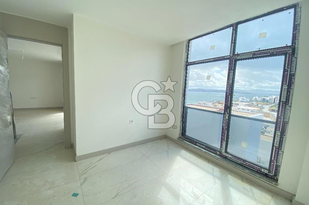 KIYIKIŞLACIK ZEYTİNLİKUYU ATASAYANLAR BEACH TE DENİZ MANZARALI 1+1 