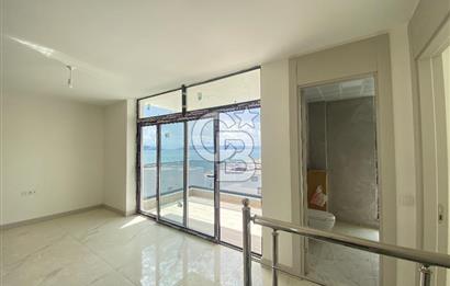 KIYIKIŞLACIK ZEYTİNLİKUYU ATASAYANLAR BEACH TE DENİZ MANZARALI 1+1 