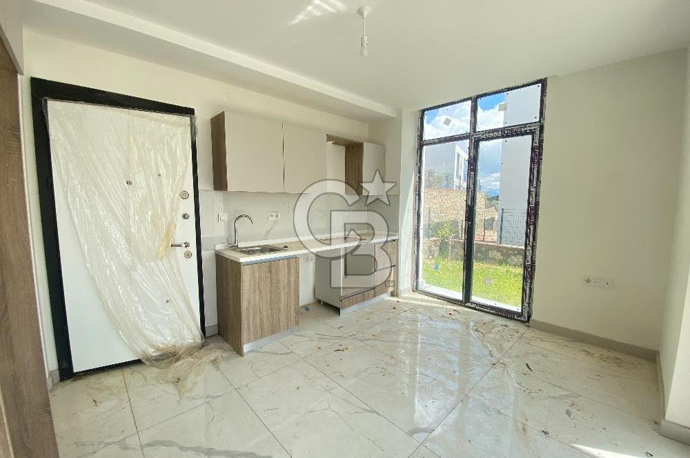 KIYIKIŞLACIK ATASAYANLAR PLAJLI SİTEDE 1+1 BAHÇE KATI