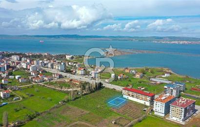 LAPSEKİ ÇARDAK DENİZE 300 METRE 3.5 KAT İMARLI KAT KARŞILIĞI SATILIK ARSA