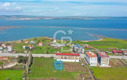 LAPSEKİ ÇARDAK DENİZE 300 METRE 3.5 KAT İMARLI KAT KARŞILIĞI SATILIK ARSA