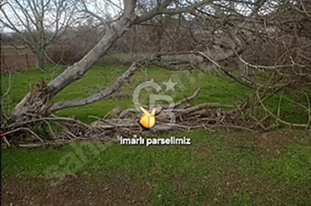 Bayramiç/Nebiler'de 220m²(142m²imarda) köy içi parsel.