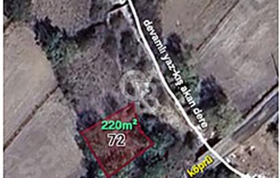 Bayramiç/Nebiler'de 220m²(142m²imarda) köy içi parsel.