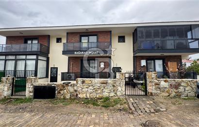 Foça Yenibağarası Mah. Kiralık Eşyasız 2+1 Bahçe Katı Daire