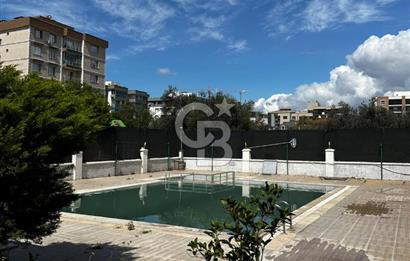 İZMİR ÇİĞLİ İNÖNÜ MAHALLESİ ZEYTİNLİ EVLER SİTESİ SATILIK 2+1 DAİRE HAVUZLU