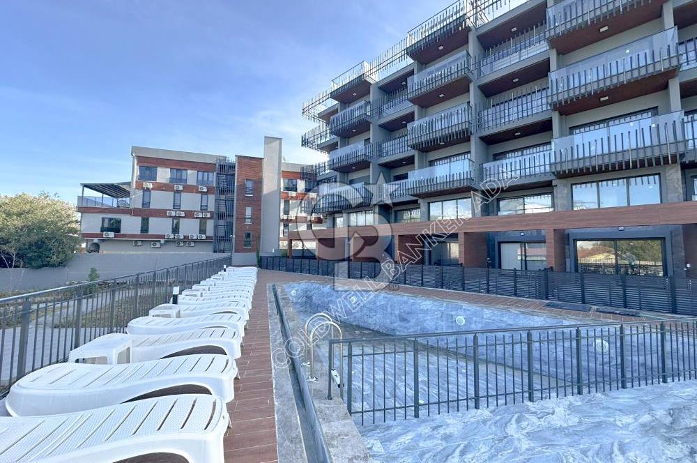 Güzelçamlı Plajına 150 Metre! Deniz Manzaralı Satılık 1+1 Daire